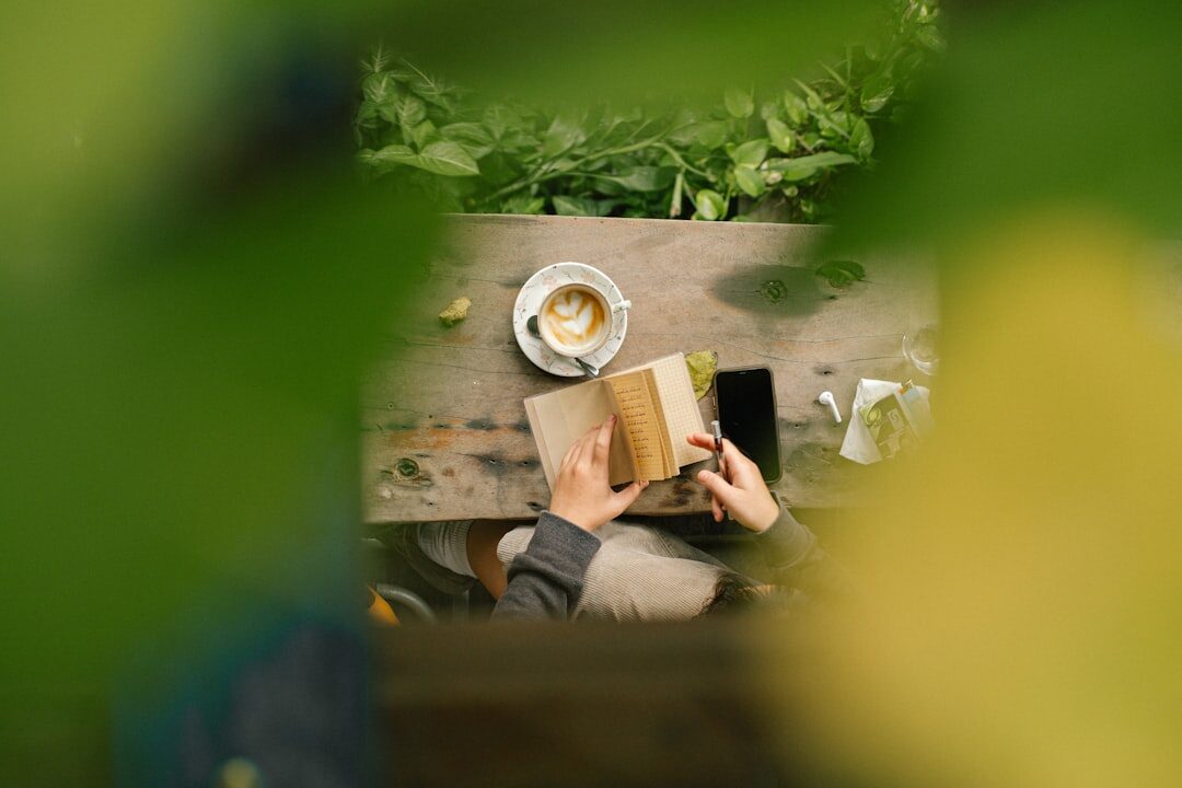person journaling in morning