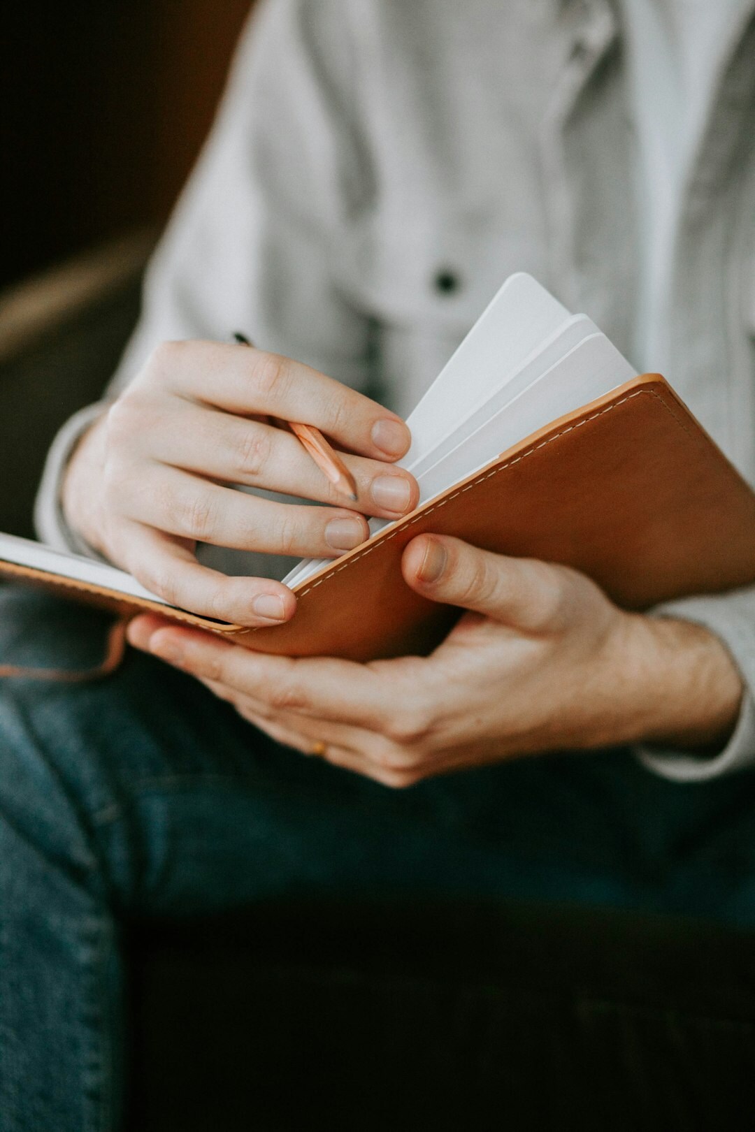person journaling emotions